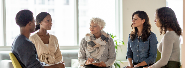 Group of adults at group therapy