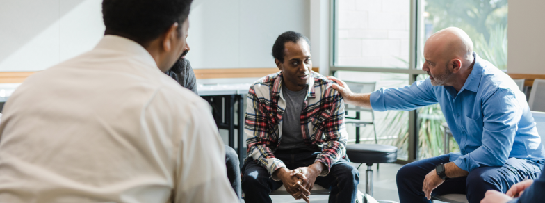 Group of Adults at a Group Therapy Session